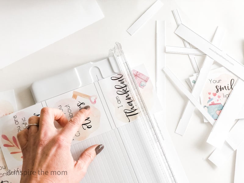 cutting the affirmation cards
