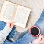 Jolabokaflod: An Icelandic Christmas Tradition for Book-Loving Families. Book and Christmas tree. Reading with coffee. www.inspirethemom.com