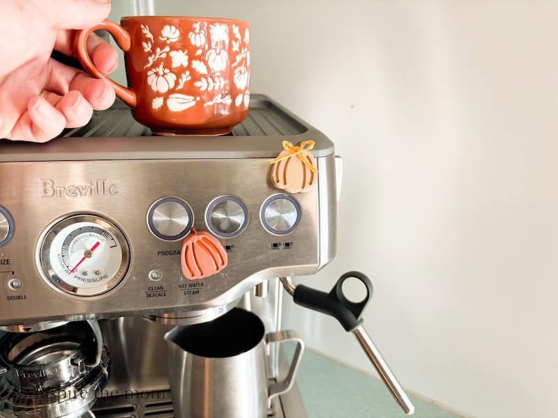 How to make Pumpkin Clay magnets, an easy fall craft. (magnets on esspresso maker) www.inspirethemom.com