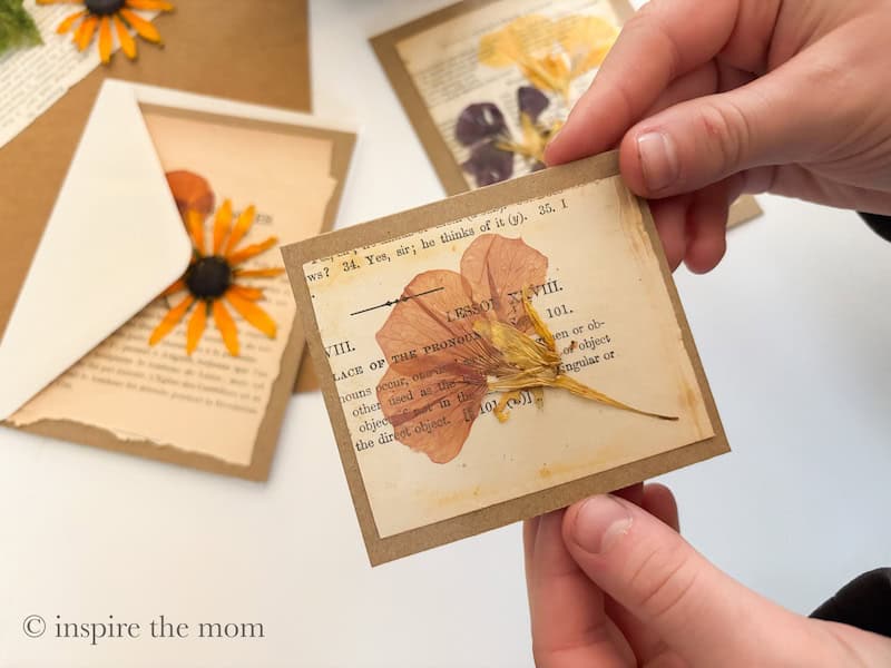 DIY Pressed Flower Cards: How to Make Vintage Book Page Greeting Cards. Pink flower cover. www.inspirethemom.com