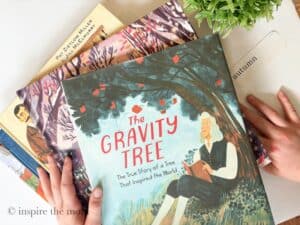 Cozy Fall Books for Kids: Picture Books to Read This Autumn. The Gravity Tree stack of books. www.inspirethemom.com