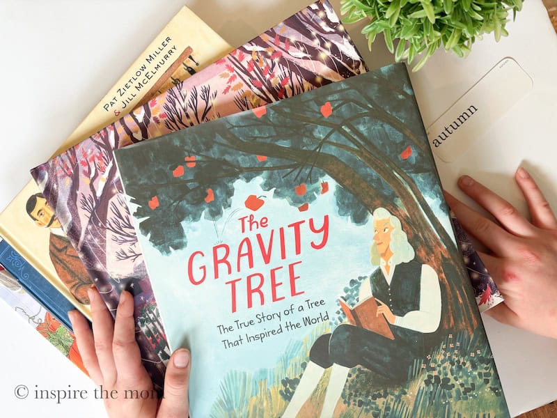 Cozy Fall Books for Kids: Picture Books to Read This Autumn. The Gravity Tree stack of books. www.inspirethemom.com